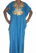 Djellaba woman blue sky and gold Casablanca