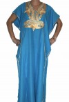 Djellaba woman blue sky and gold Casablanca