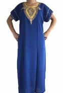 Mujer chilaba azul y oro del Essaouira
